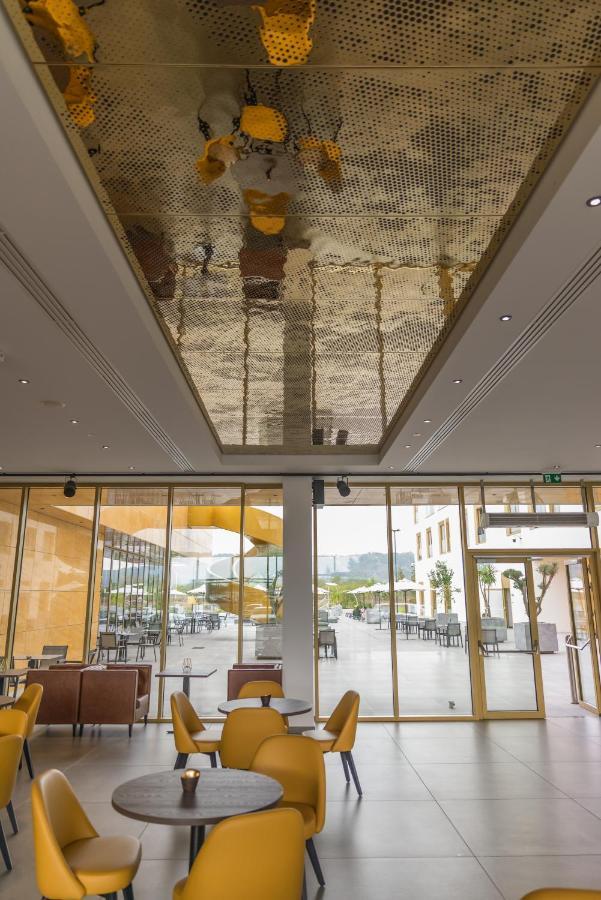 Mk Hotel Tirana Rinas Exterior foto The ceiling of the lobby