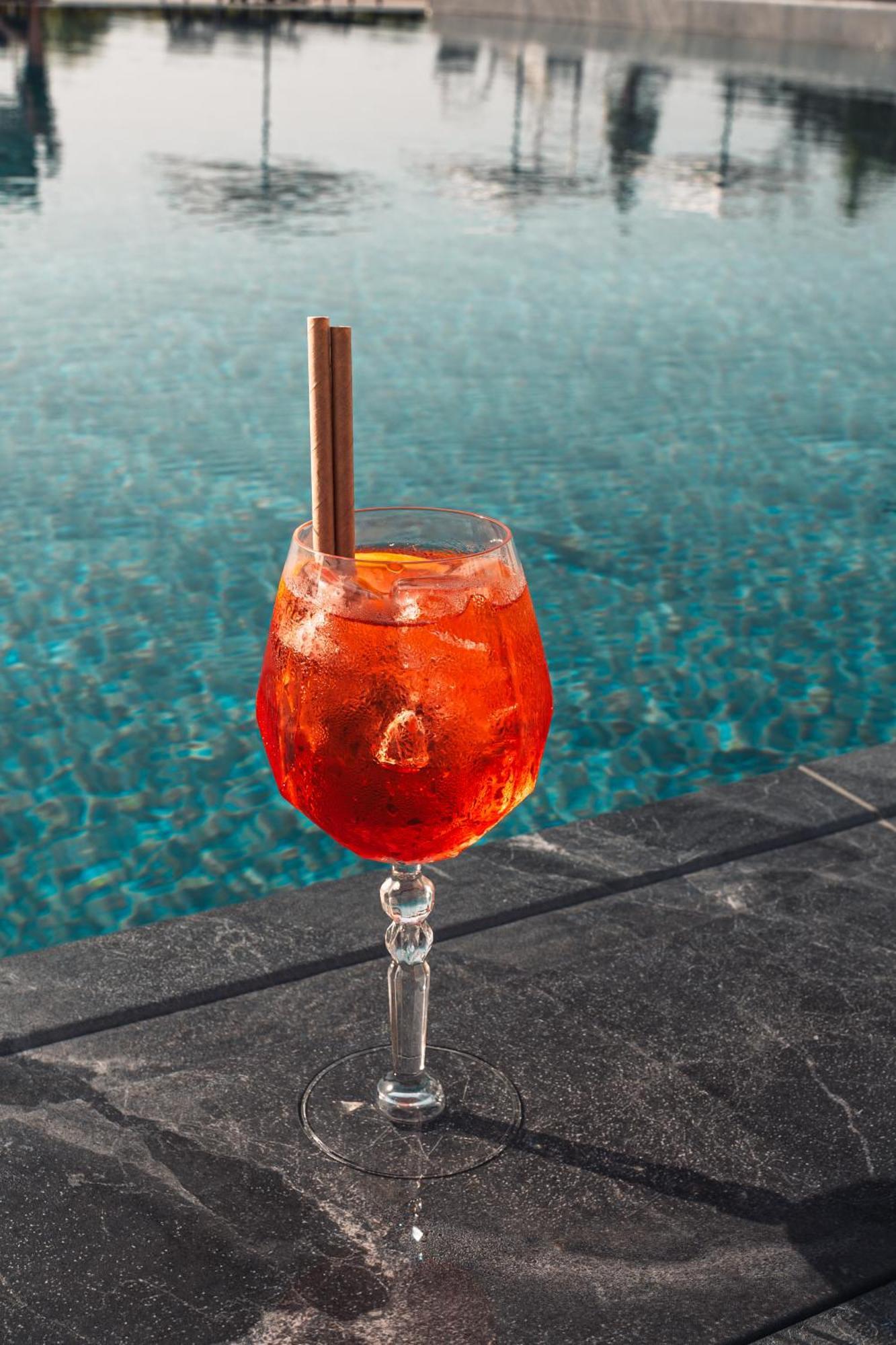 Mk Hotel Tirana Rinas Exterior foto A glass of Aperol Spritz